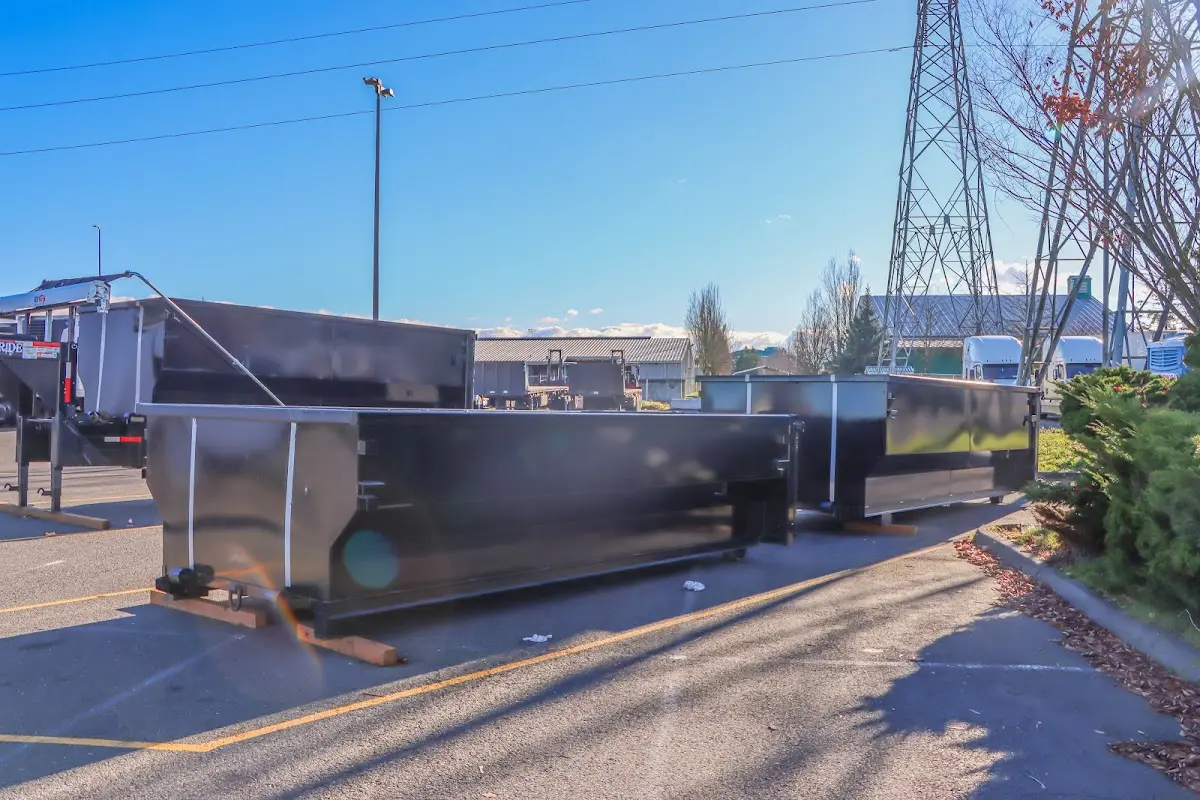 Roll-off dumpster ready for waste disposal at job site for 2 Yard Dumpster Rental in Rockaway